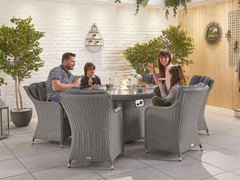 Nova Outdoor Living Heritage Camilla 6 Seat Dining Set With Fire Pit 1 5m Round Table At Gardenman Heritage Camilla 6 Seat Dining Set, Heritage Collection Outdoor Furniture